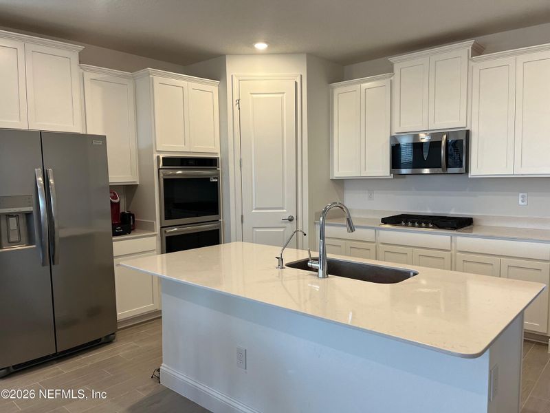Furnished interior view inside a new home in Silver Falls Single Family at SilverLeaf, St. Augustine (Image 7).