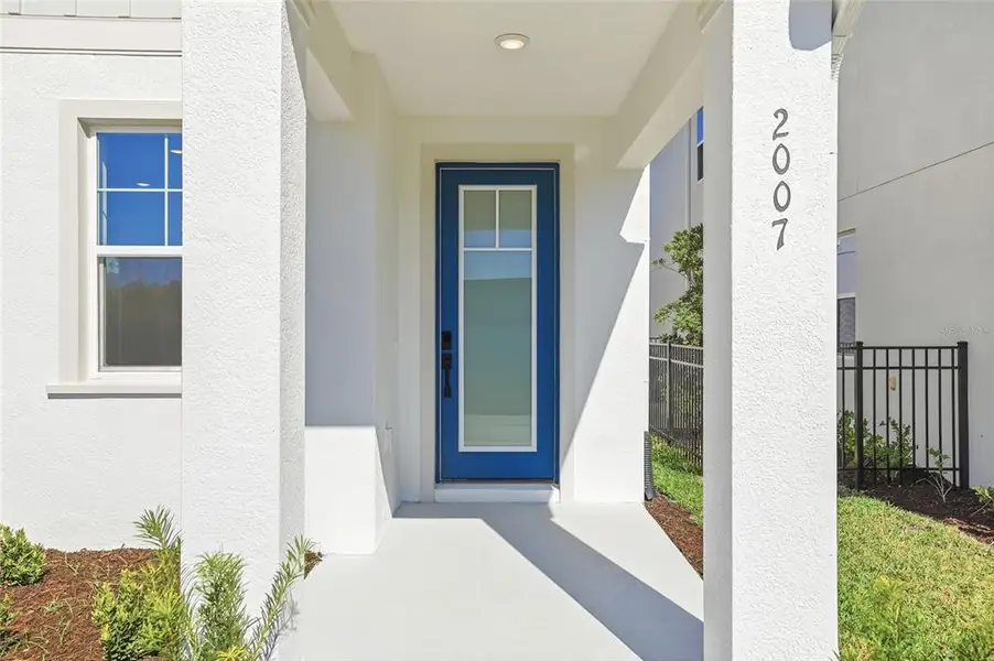 Exterior details and patio area of a home in Vivir, Valrico (Image 4).