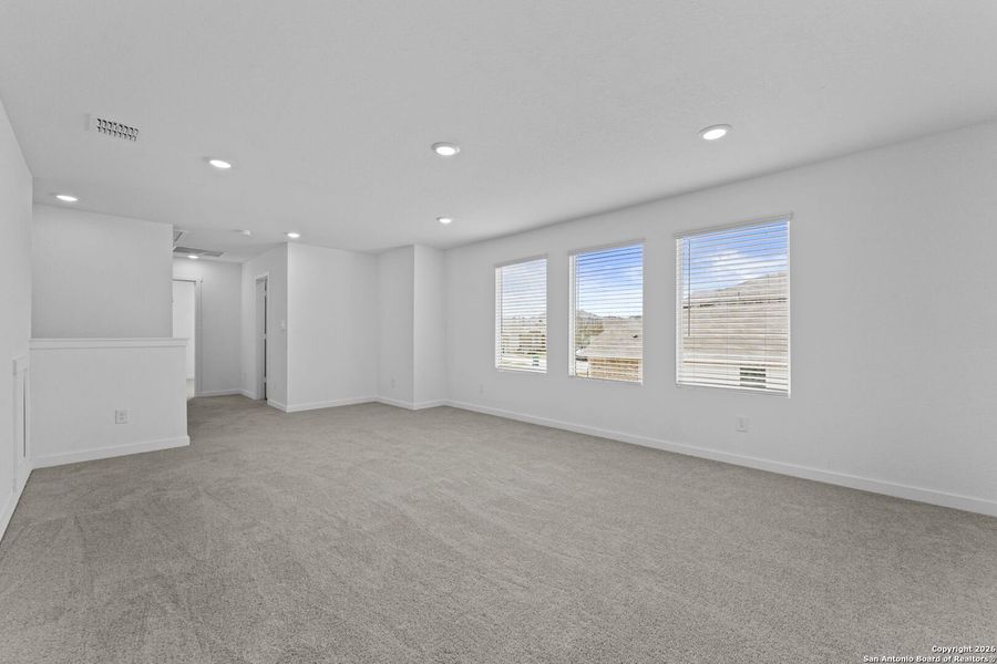 Spacious, unfurnished interior of a new home in Hightop Ridge, Converse (Image 18).