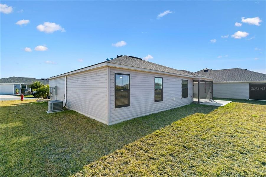 Exterior details and patio area of a home in , The Villages (Image 22).