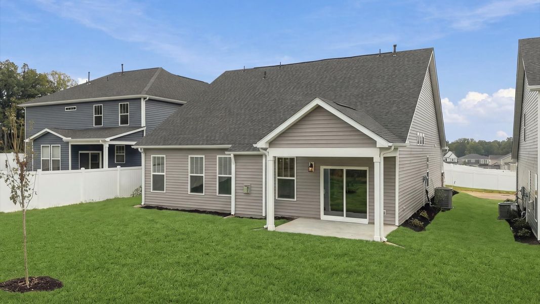 Exclusive rear covered porch with accomplished detail and elevated outdoor living potential at the Fox Hollow community