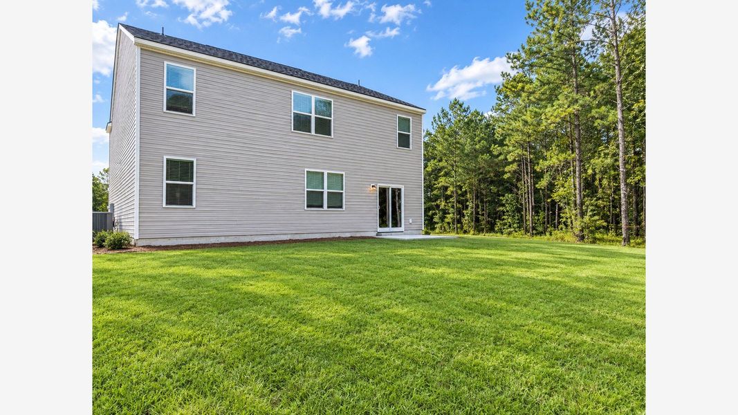 Exterior details and patio area of a home in Cypress Landing, Hardeeville (Image 2).
