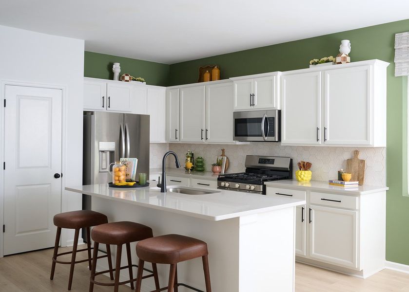 Representative furnished interior of a home built from the The Pintail End by David Weekley Homes in Nexus Townhomes, Gallatin (Image 5).