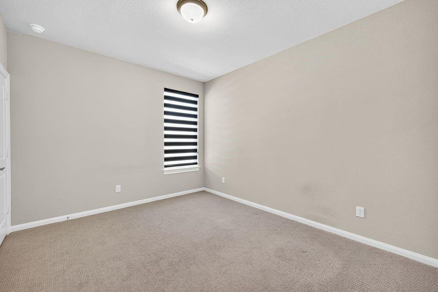 Spacious, unfurnished interior of a new home in Spring Brook Village - Luxe Series, Houston (Image 20).