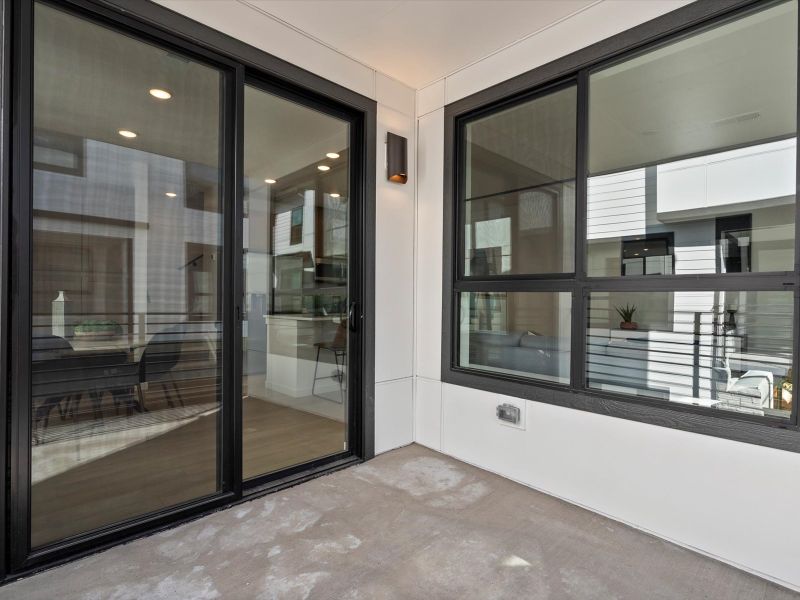 Exterior details and patio area of a home in The Hub at Virginia Village, Denver (Image 20).