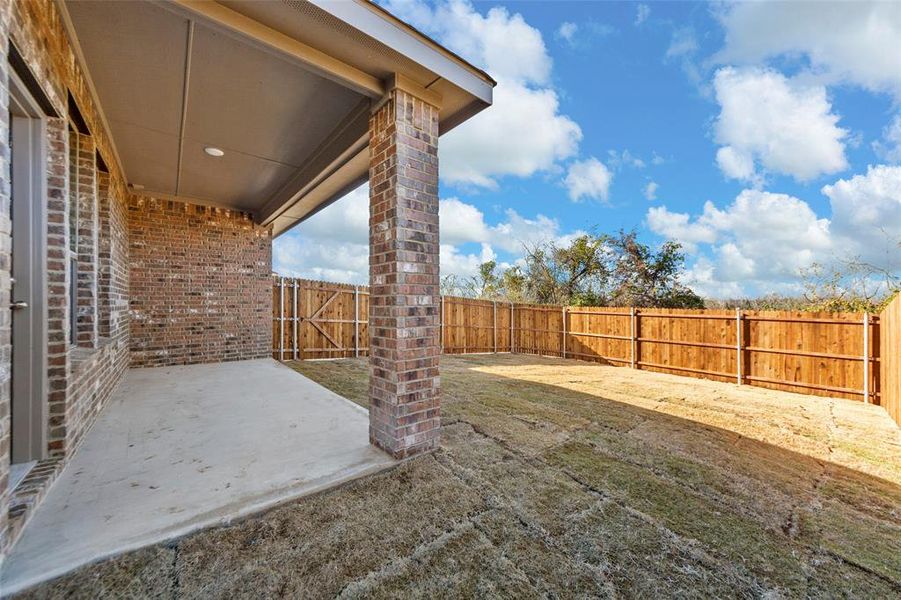 View of yard with a patio