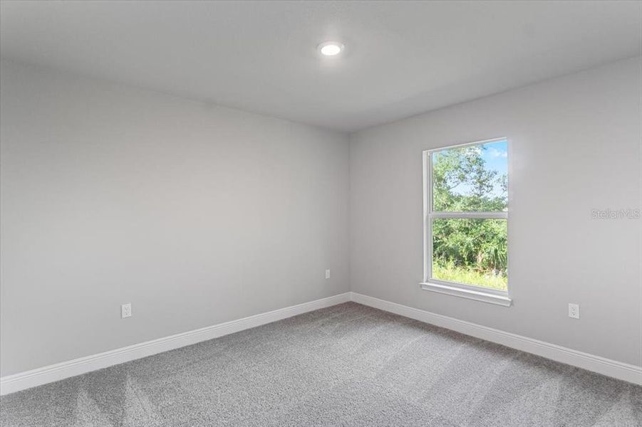Spacious, unfurnished interior of a new home in , Port Charlotte (Image 10).
