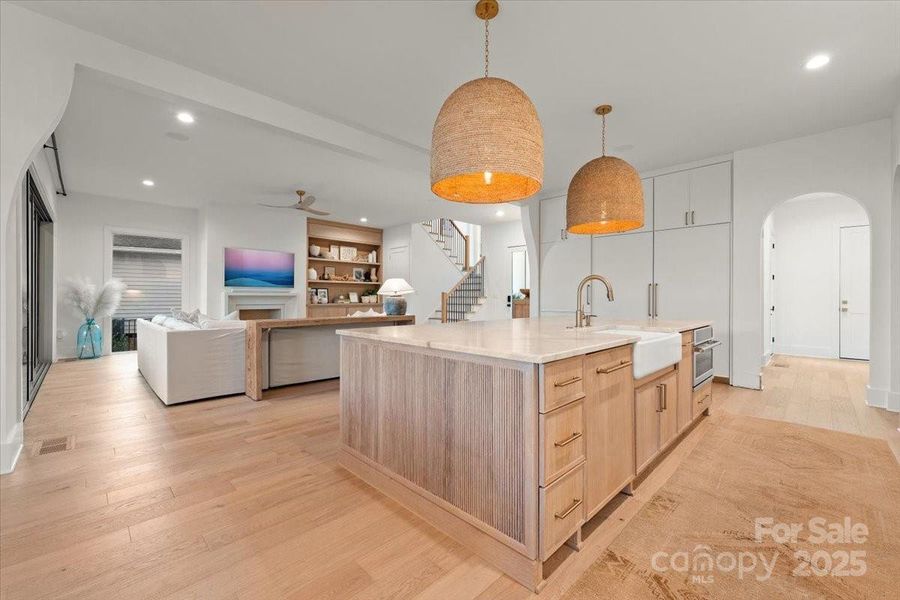 Custom-designed cabinetry with soft close drawers and integrated panel fronts Custom-designed cabinetry with soft close drawers and integrated panel fronts