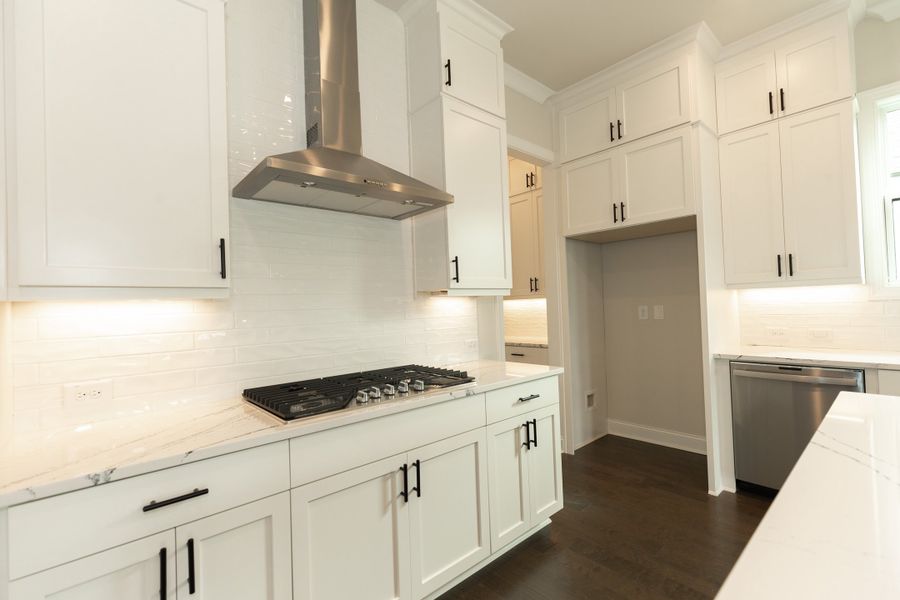 Representative furnished interior of a home built from the The Madilyn by The Providence Group in Waterhaven, Cumming (Image 11).