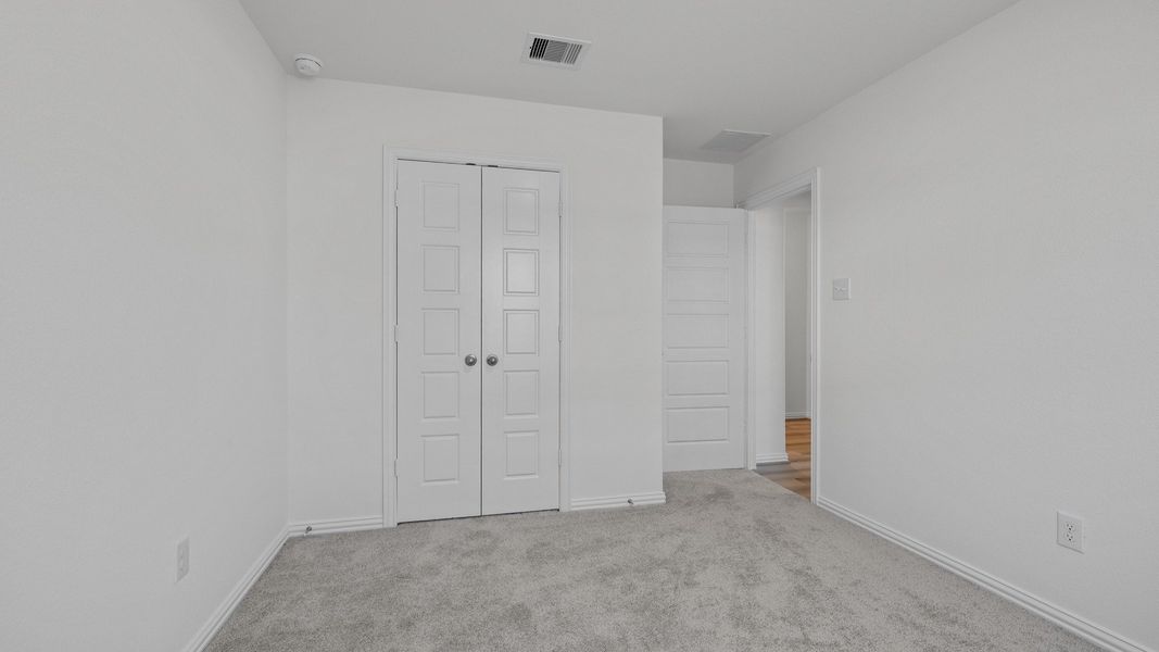 Furnished interior view inside a new home in Oakwood Estates, Waller (Image 11).