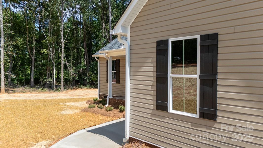 Front exterior of a new home in , Chester, SC, highlighting curb appeal (Image 18).