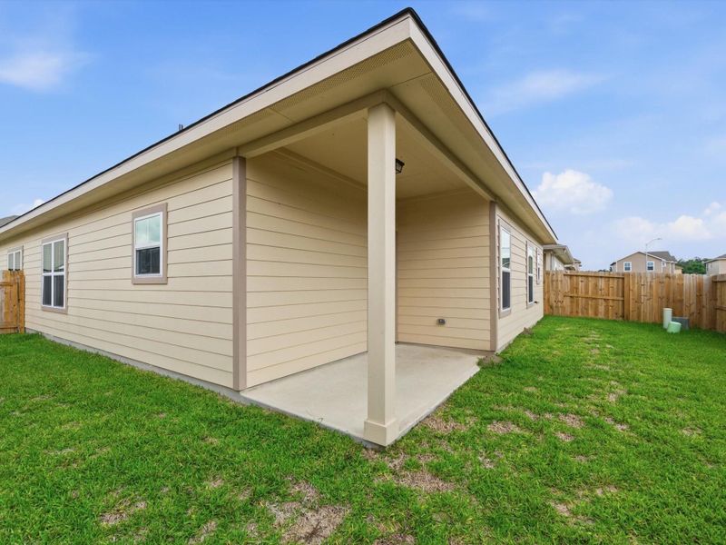 Exterior details and patio area of a home in , Houston (Image 4).