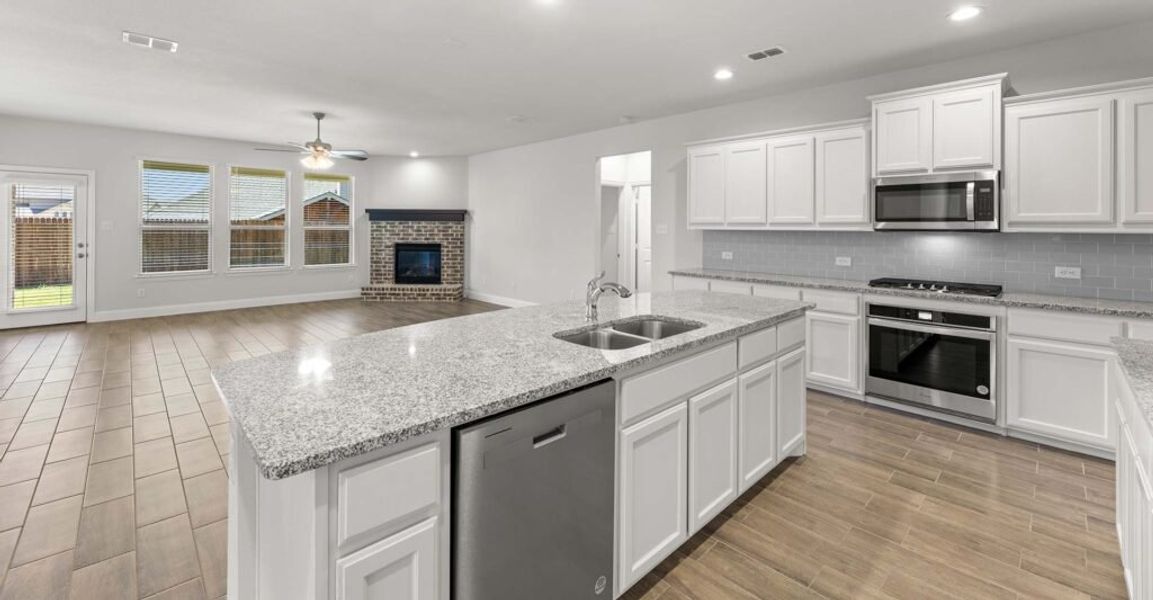 Representative exterior photo of a completed home built from the Goodrich by Impression Homes in Timberbrook, Justin, TX (Image 9).