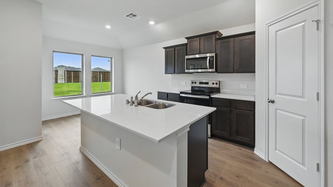 Furnished interior view inside a new home in Saddlebrook, Waxahachie (Image 3). Furnished interior view inside a new home in Saddlebrook, Waxahachie (Image 3).