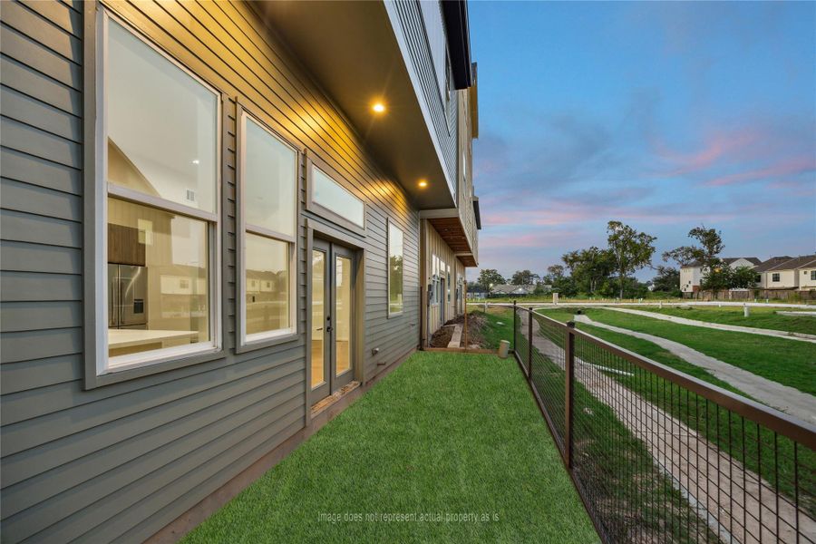 Exterior details and patio area of a home in , Houston (Image 15). Exterior details and patio area of a home in , Houston (Image 15).
