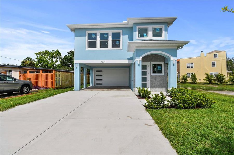 Front exterior of a new home in , St. Petersburg, FL, highlighting curb appeal (Image 25).