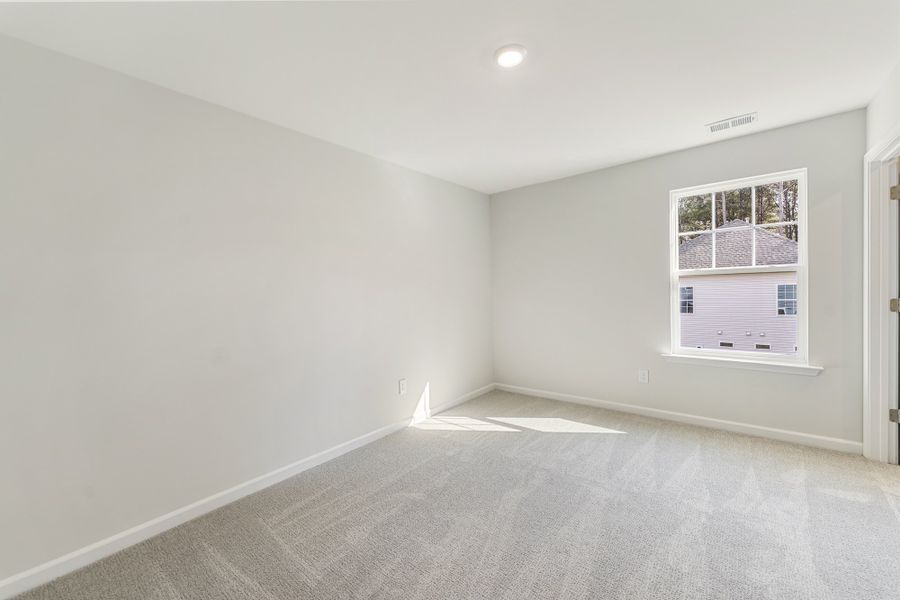 Spacious, unfurnished interior of a new home in Landing at Pine Lake, Anderson (Image 31).