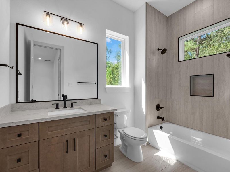 The ensuite bathroom and this room has a great size closet
