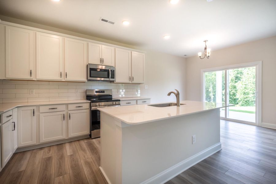 Furnished interior view inside a new home in Cottages at Piper Village, Trinity (Image 9). Furnished interior view inside a new home in Cottages at Piper Village, Trinity (Image 9).
