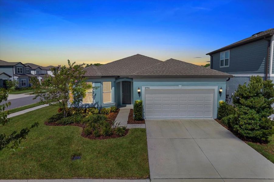 Front exterior of a new home in , Land O' Lakes, FL, highlighting curb appeal (Image 18).