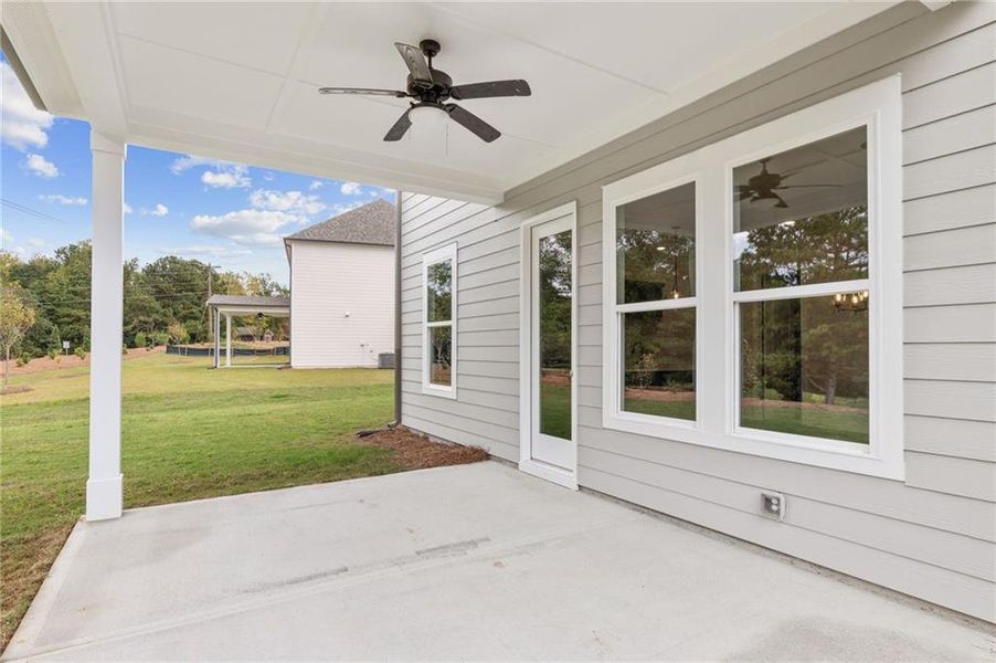 Exterior details and patio area of a home in Ashbury Commons, Powder Springs (Image 28).
