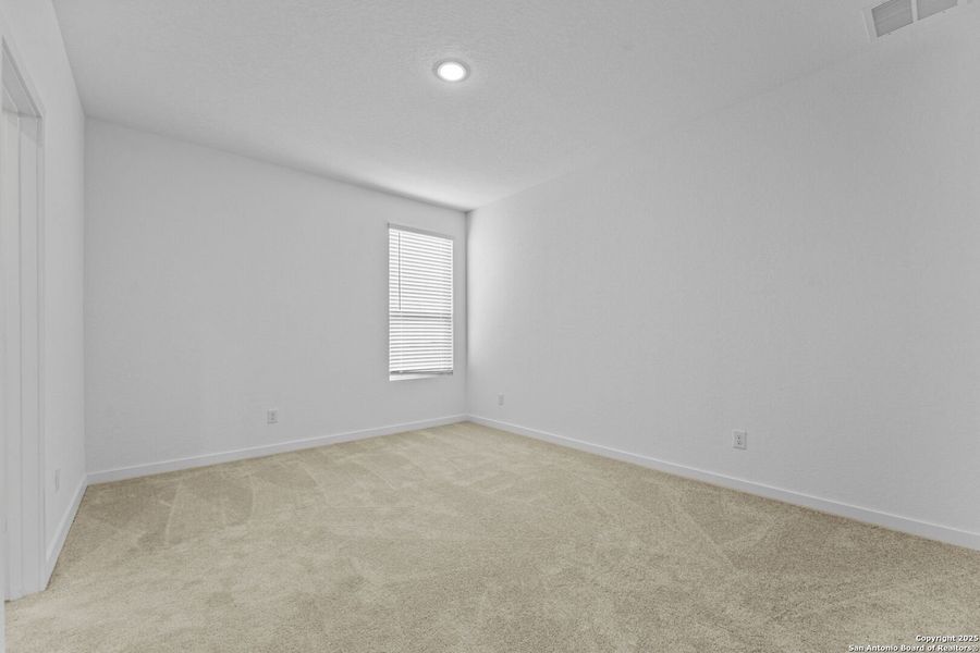 Spacious, unfurnished interior of a new home in Hidden Trails: Coastline Collection, Bulverde (Image 22).