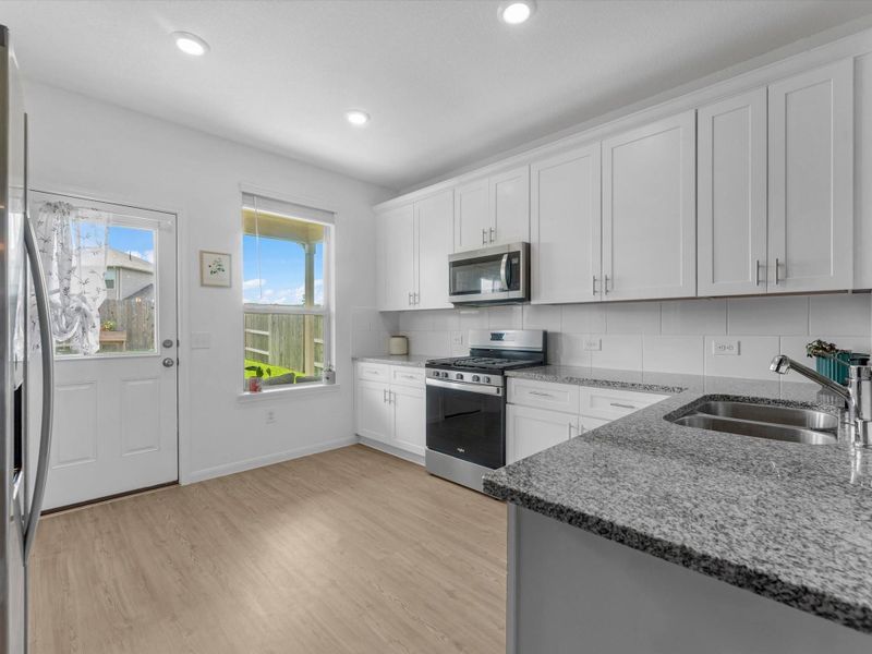 Furnished interior view inside a new home in Mavera, Conroe (Image 8).