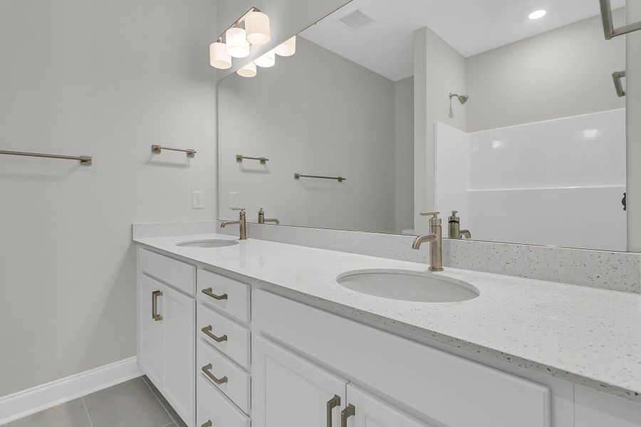 Furnished interior view inside a new home in Tidewater at Lakes of Cane Bay, Summerville (Image 9).