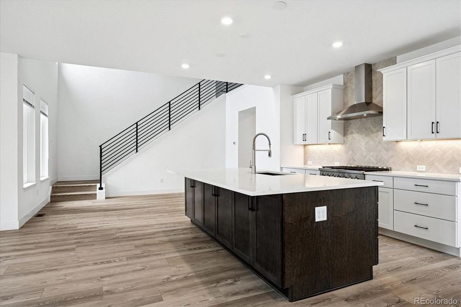 Front entrance view of the kitchen and dining areas Front entrance view of the kitchen and dining areas