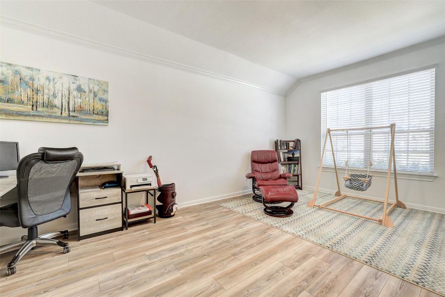 Office area with vaulted ceiling