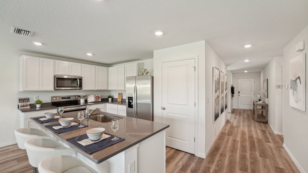 Furnished interior view inside a new home in Sunset Hills, Summerfield (Image 4).