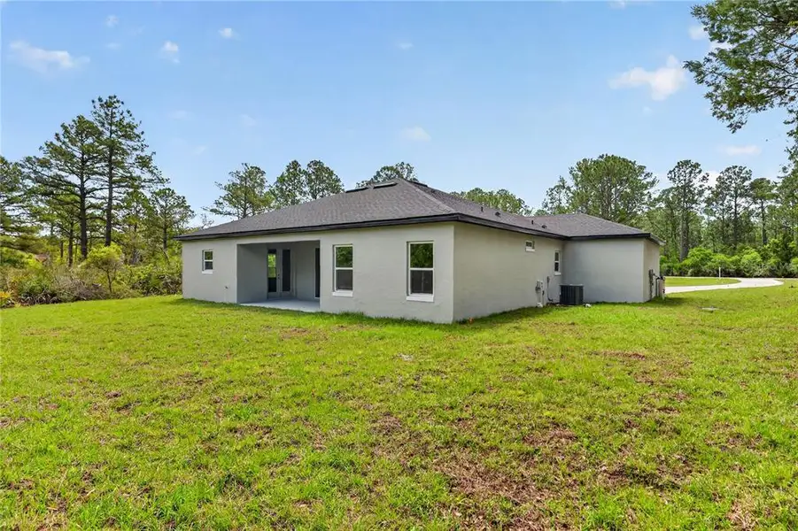 Exterior details and patio area of a home in , Eustis (Image 22).
