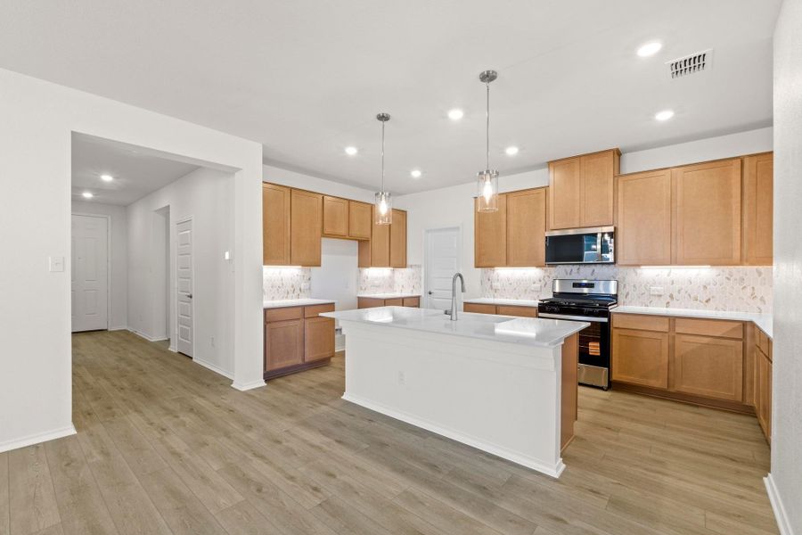 Furnished interior view inside a new home in Salerno - Classic Collection, Round Rock (Image 11). Furnished interior view inside a new home in Salerno - Classic Collection, Round Rock (Image 11).