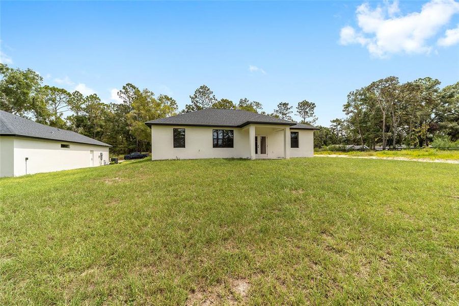 Exterior details and patio area of a home in , Ocala (Image 29).