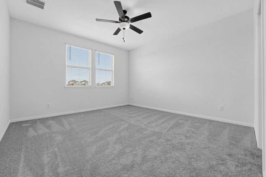 Representative unfurnished interior of a home built from the Pheasant by Taylor Morrison in Emory Crossing, Hutto (Image 10).