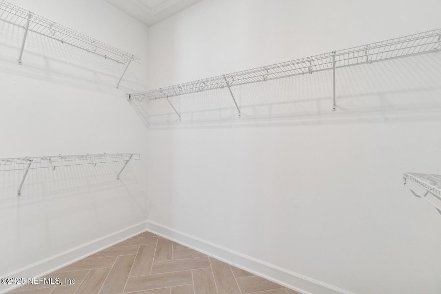 Spacious, unfurnished interior of a new home in Evergreen Island at Silverleaf - Classic, St. Augustine (Image 24).