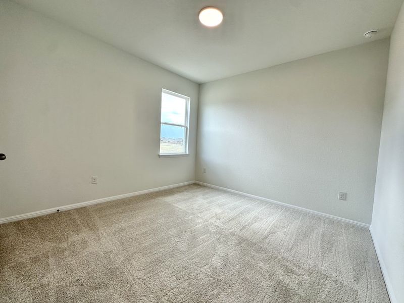 Spacious, unfurnished interior of a new home in Crosswinds, Kyle (Image 9).