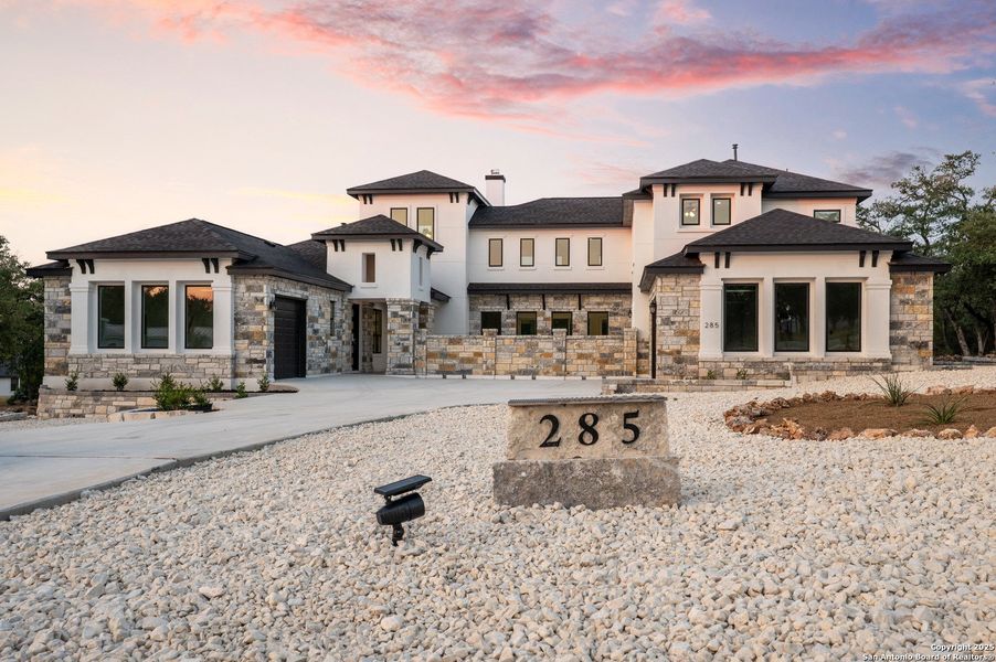 Front exterior of a new home in , New Braunfels, TX, highlighting curb appeal (Image 22).