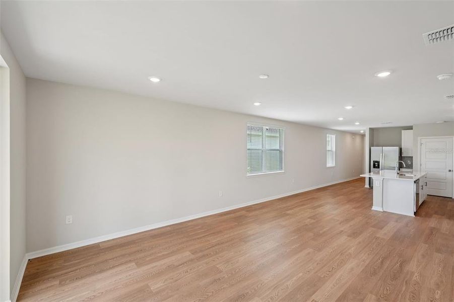 Spacious, unfurnished interior of a new home in Crescent Lakes - Premier Series, Punta Gorda (Image 13).