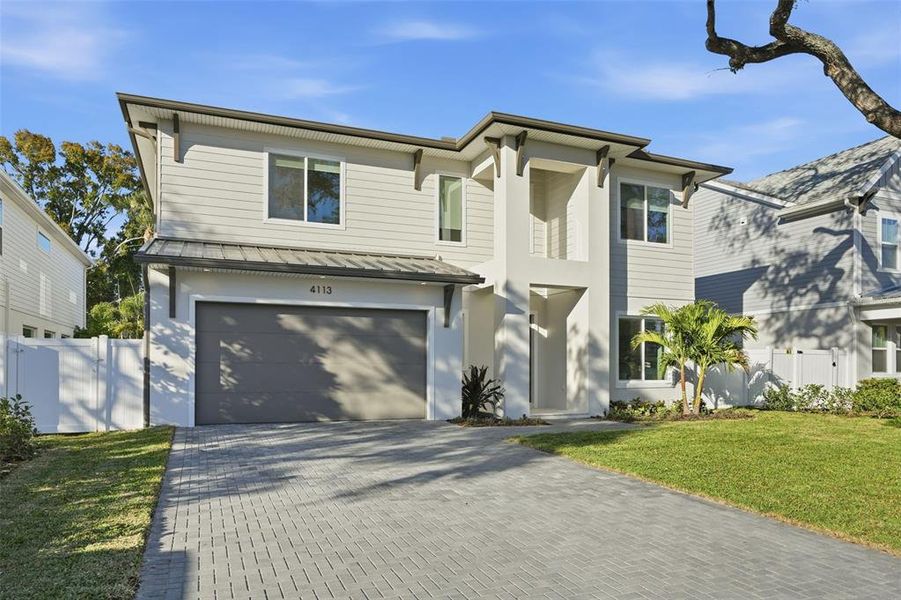 Front exterior of a new home in , Tampa, FL, highlighting curb appeal (Image 30).