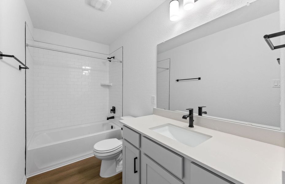 Representative furnished interior of a home built from the Alexander by Pulte Homes in Wolf Ranch, Georgetown (Image 6).