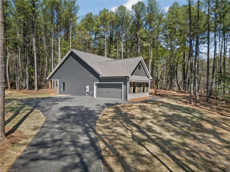 Front exterior of a new home in , Silver Creek, GA, highlighting curb appeal (Image 28).