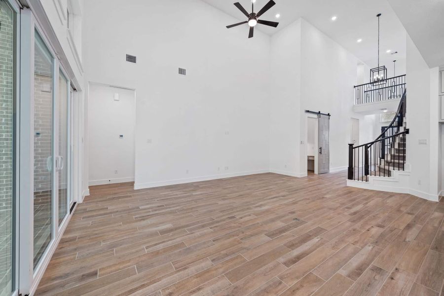 Representative unfurnished interior of a home built from the Waterloo 60′ Lot by Chesmar Homes in Fulshear Lakes, Fulshear (Image 29).