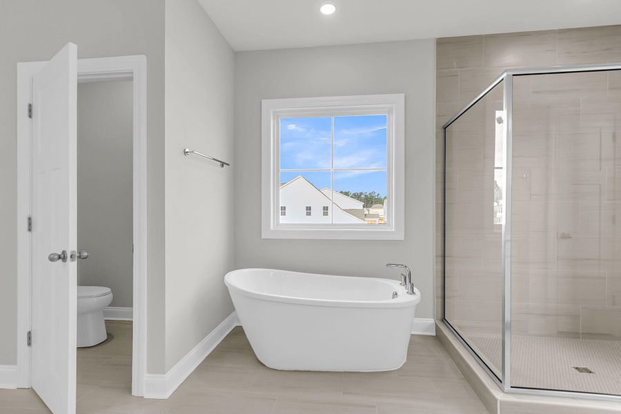 Furnished interior view inside a new home in Tidewater at Lakes of Cane Bay, Summerville (Image 12).