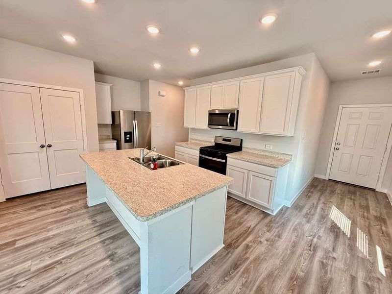 Furnished interior view inside a new home in Barrett Crossing, Crosby (Image 3).