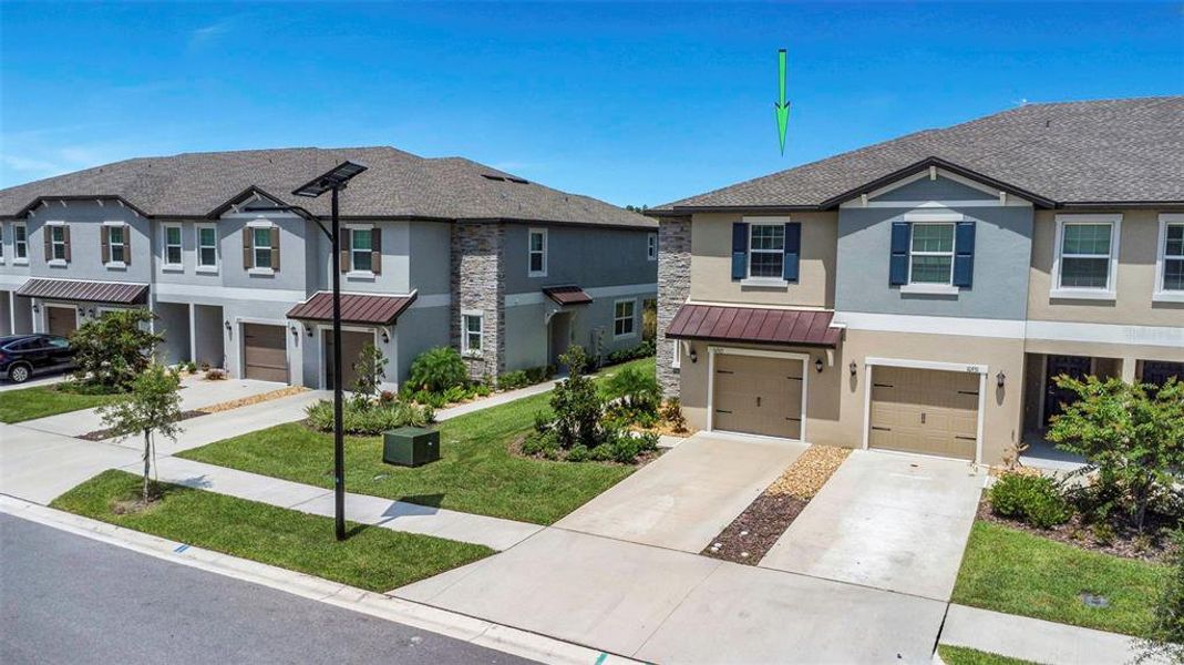 Front exterior of a new home in , Land O' Lakes, FL, highlighting curb appeal (Image 21).