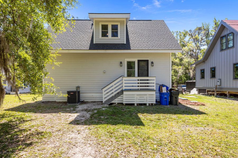 Exterior details and patio area of a home in , Johns Island (Image 25).