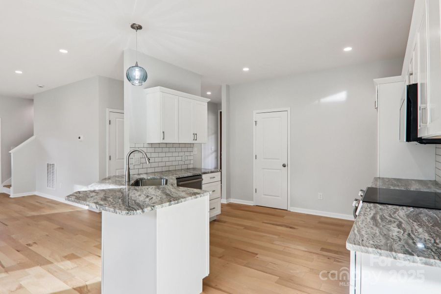 Furnished interior view inside a new home in , Candler (Image 11).