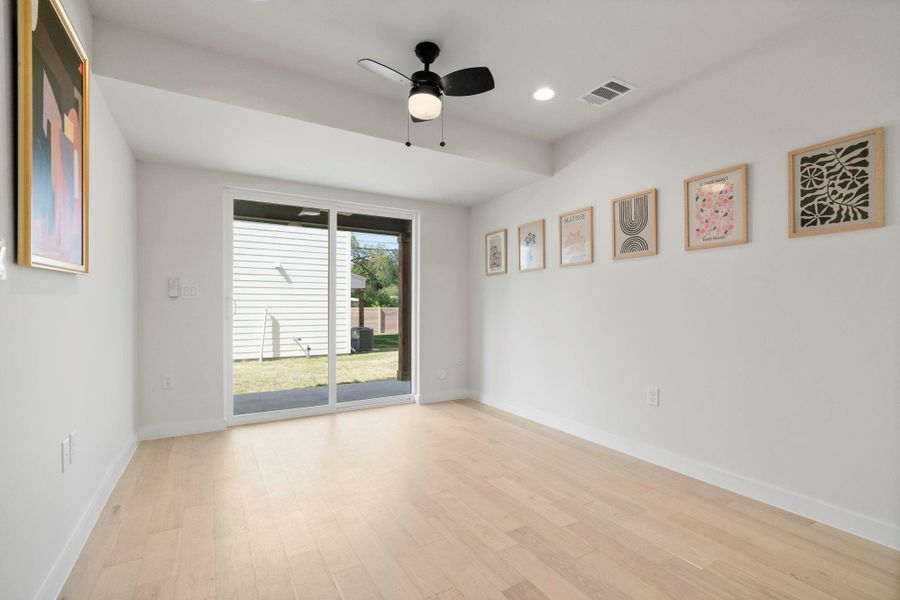Spare room with light wood-style floors, recessed lighting, and ceiling fan