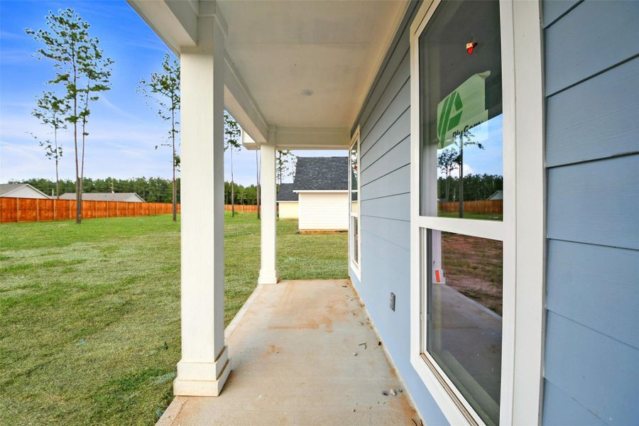 Exterior details and patio area of a home in , Conroe (Image 2). Exterior details and patio area of a home in , Conroe (Image 2).